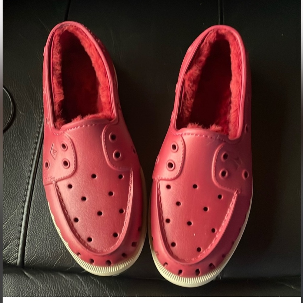 Red croc type shoes